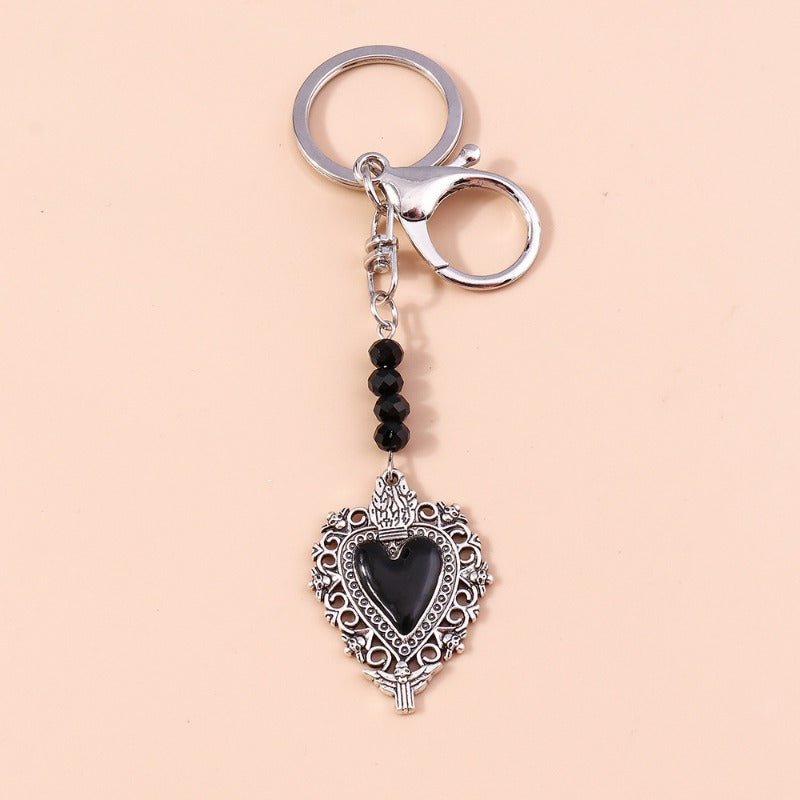 Wholesale Butterfly Cross Hollow Lace Love Devil Eyes Keychain